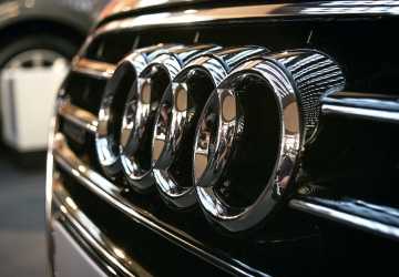 What do the four rings of Audi represent?